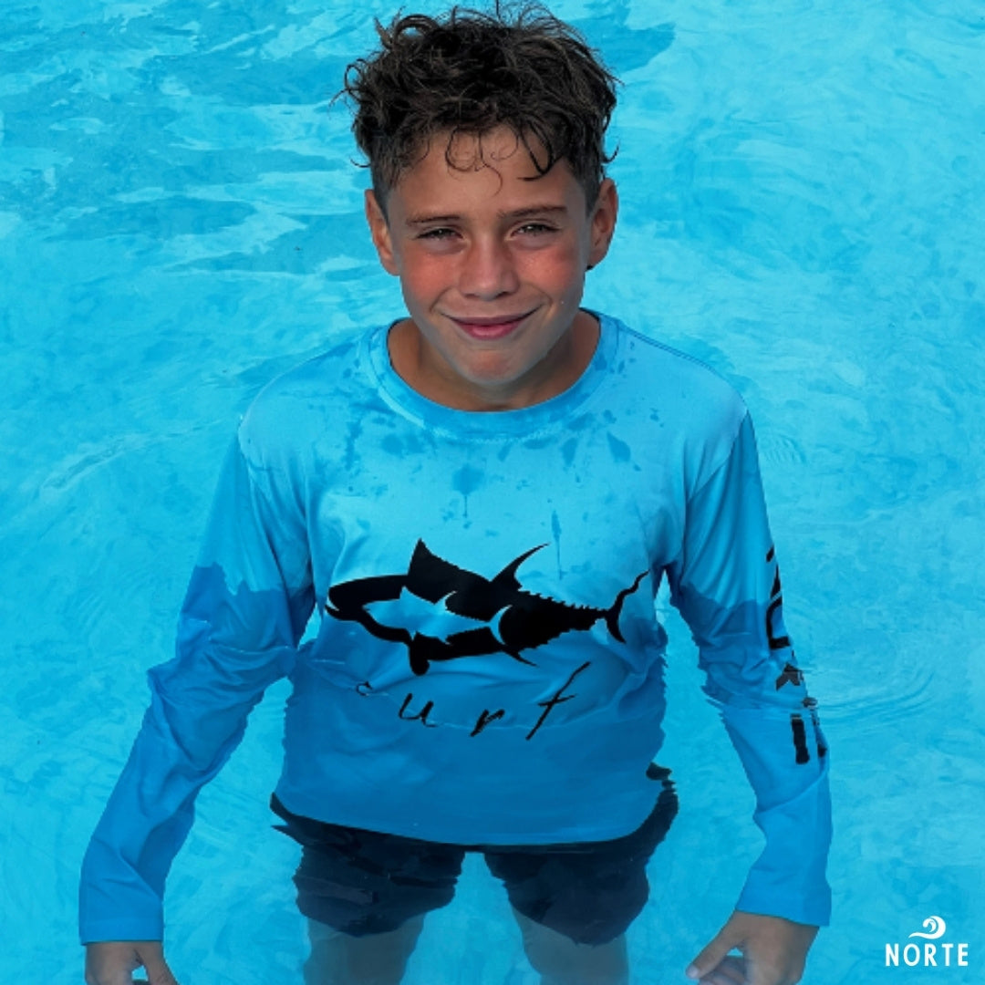 flatlock seams and flexible fit of the rash guard, allowing for smooth movement and active play.